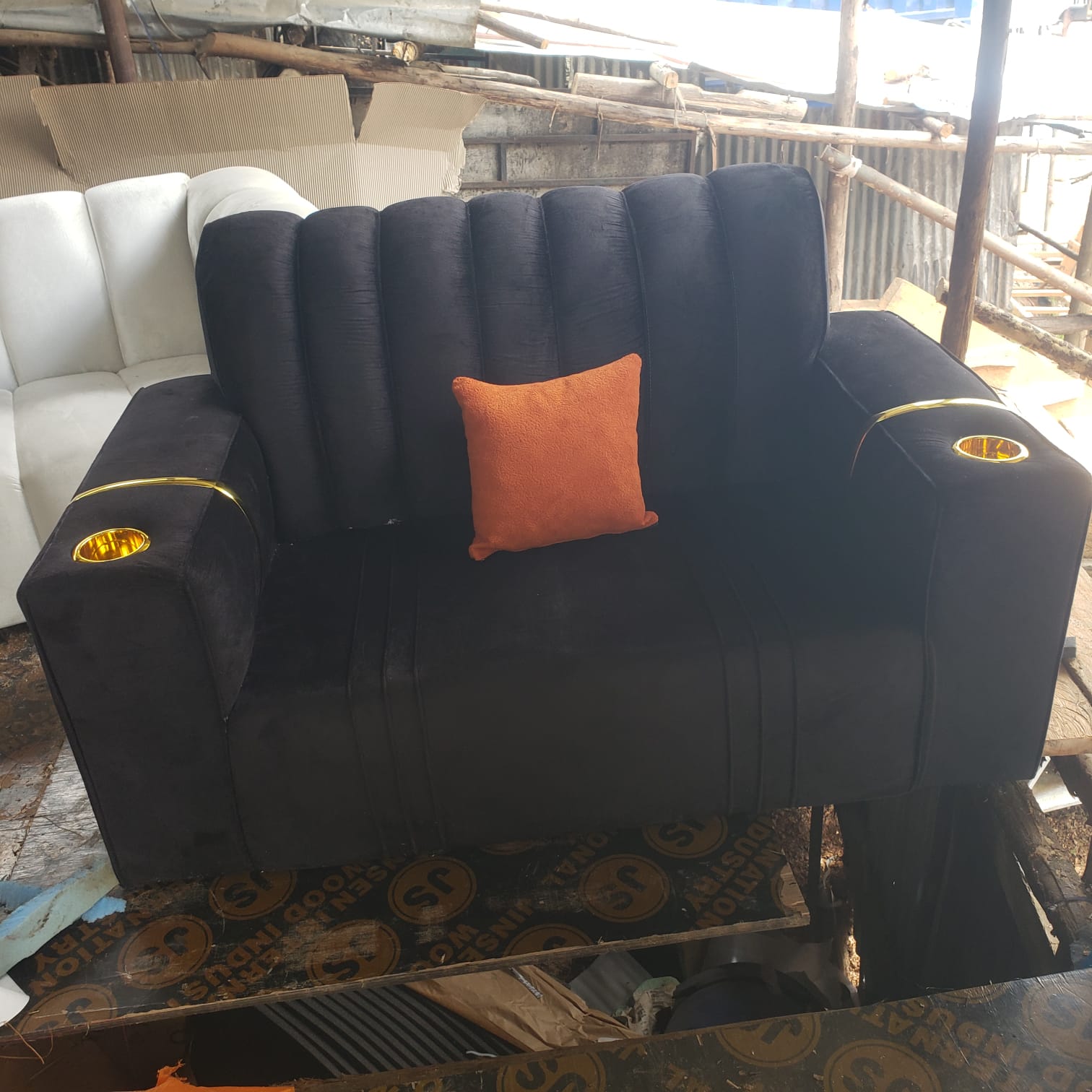 Velvet two-seater sofa with cup holders