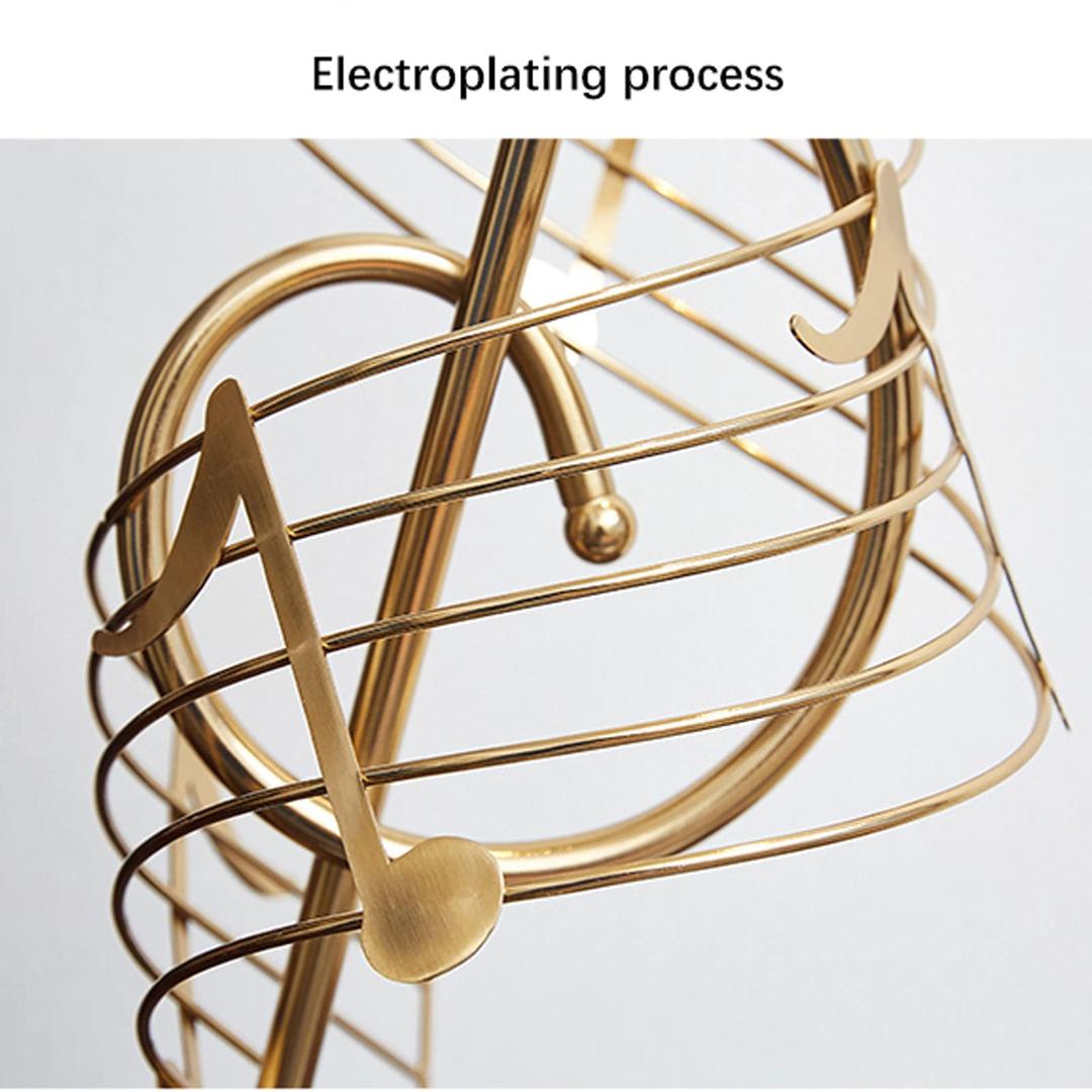 Golden Musical Harmony Sculpture - Treble Clef Armillary Sphere with Notes, Elegant Black Base Modern Art Decor