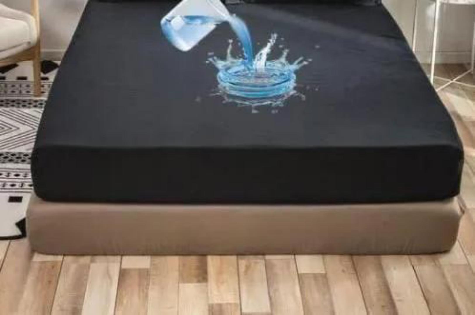 Mackintosh Top-Side Mattress Cover, a 100% waterproof protector designed to shield mattresses from spills, dust, and bed-wetting