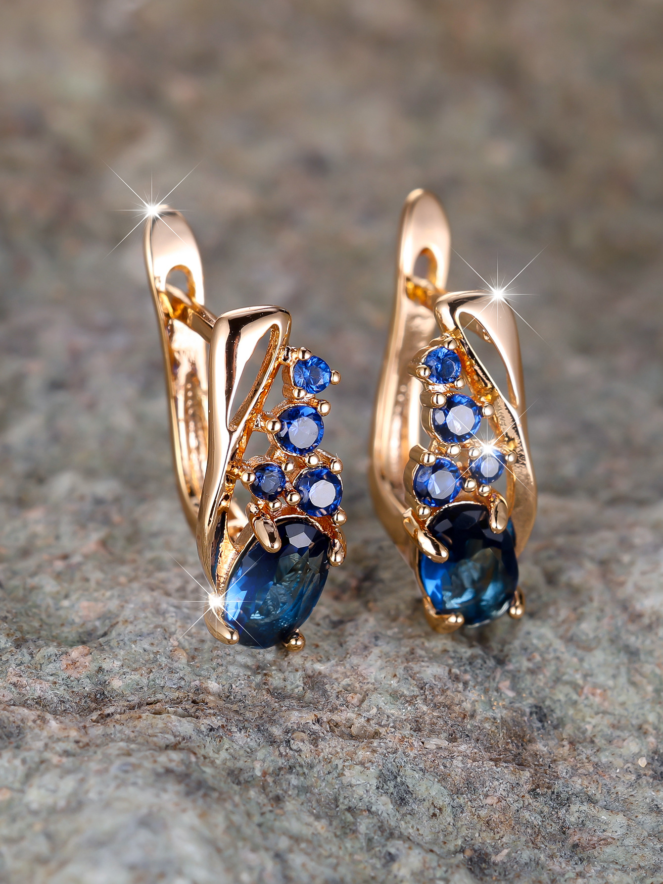 Champagne gold earrings with four small round diamonds and oval cubic zirconia stones - elegant, fashionable, and vintage style for women.