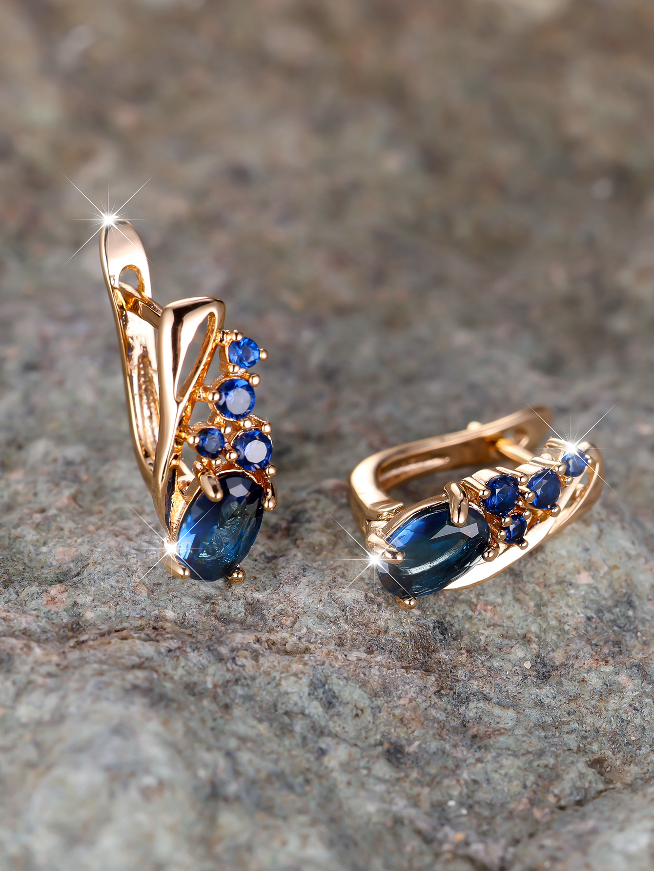 Champagne gold earrings with four small round diamonds and oval cubic zirconia stones - elegant, fashionable, and vintage style for women.