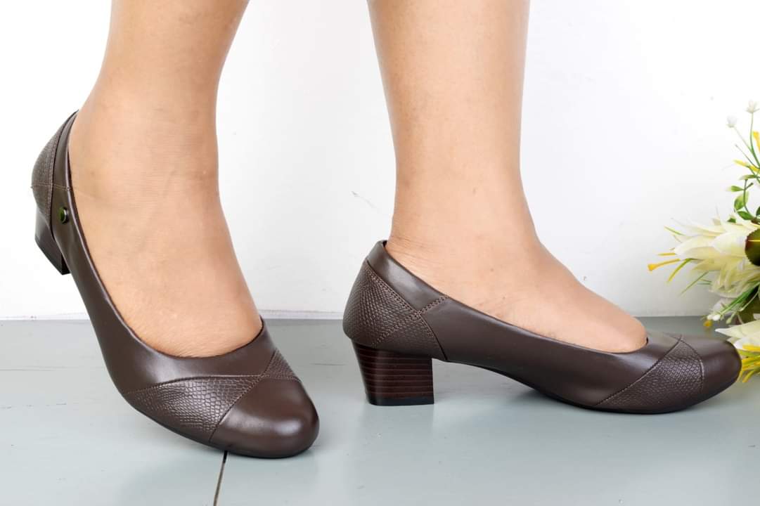 LATEST Comfortable High End ladies low heeled shoes featuring a block heel and textured detailing.