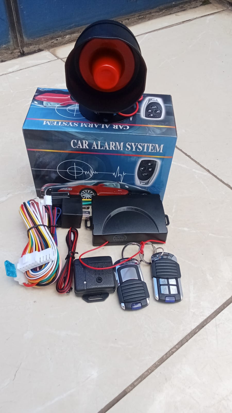 AVAILLABLE‼️Car Alarm system TSK-102/T310 Normal🔥supports a long-range remote control arm/disarm. This enables you to use the remote to arm or disarm the car when you’re quite a distance from it .For