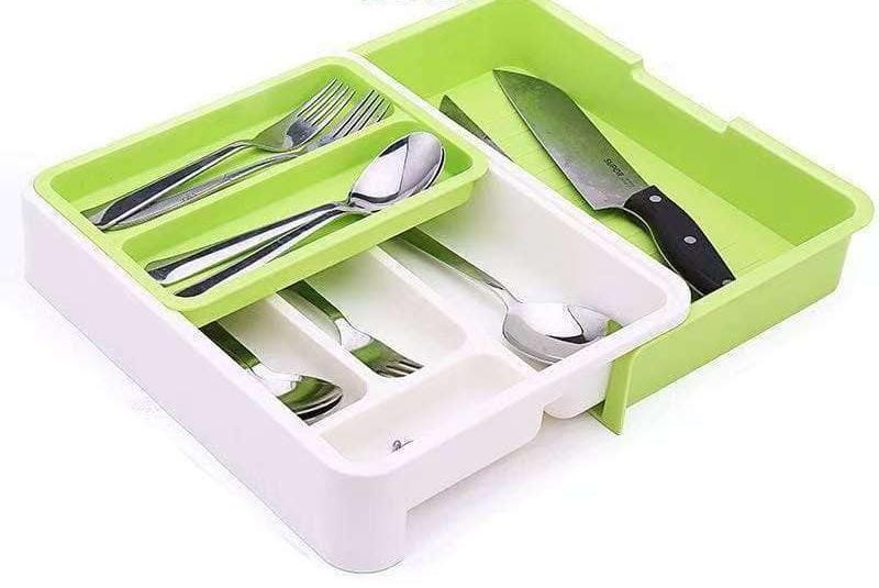 DRAWER ORGANIZER. Kitchen Expandable Cutlery Drawer Organizer Tray,  design provides four deep-sided compartments for holding cutlery, a utensil area for knives or larger kitchen tools.