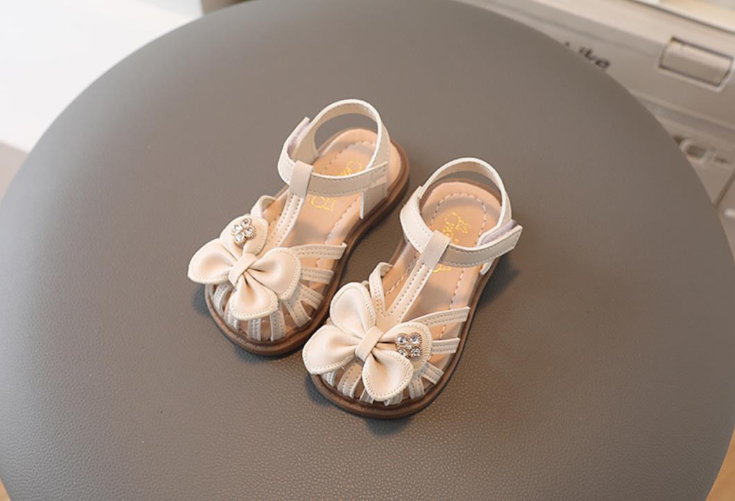 New girls' hollow out anti slip and wear-resistant sandals Korean version bow princess shoes soft sole single shoe