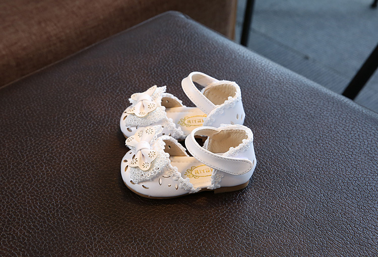 New girls' hollow out anti slip and wear-resistant sandals half sandals Korean version children's bow princess baby shoes soft sole fashionable single shoe