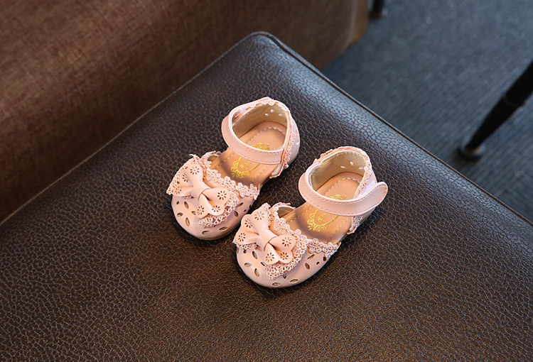 New girls' hollow out anti slip and wear-resistant sandals half sandals Korean version children's bow princess baby shoes soft sole fashionable single shoe