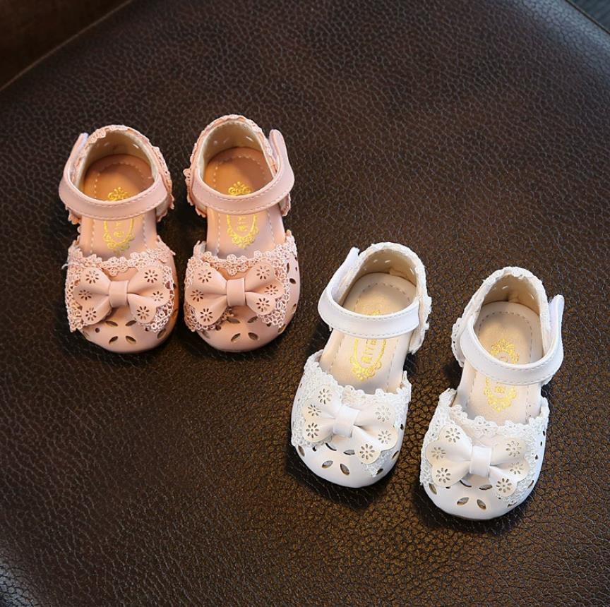 New girls' hollow out anti slip and wear-resistant sandals half sandals Korean version children's bow princess baby shoes soft sole fashionable single shoe