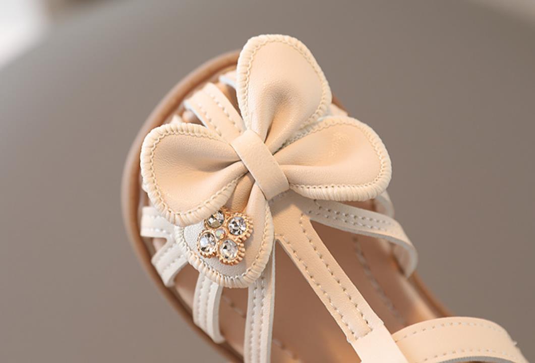 New girls' hollow out anti slip and wear-resistant sandals Korean version bow princess shoes soft sole single shoe