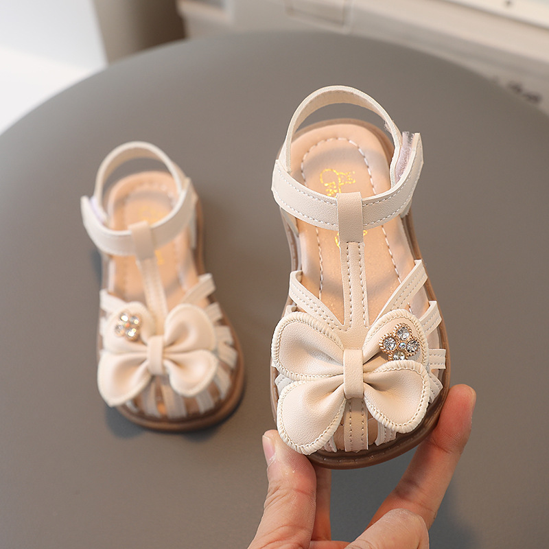 New girls' hollow out anti slip and wear-resistant sandals Korean version bow princess shoes soft sole single shoe