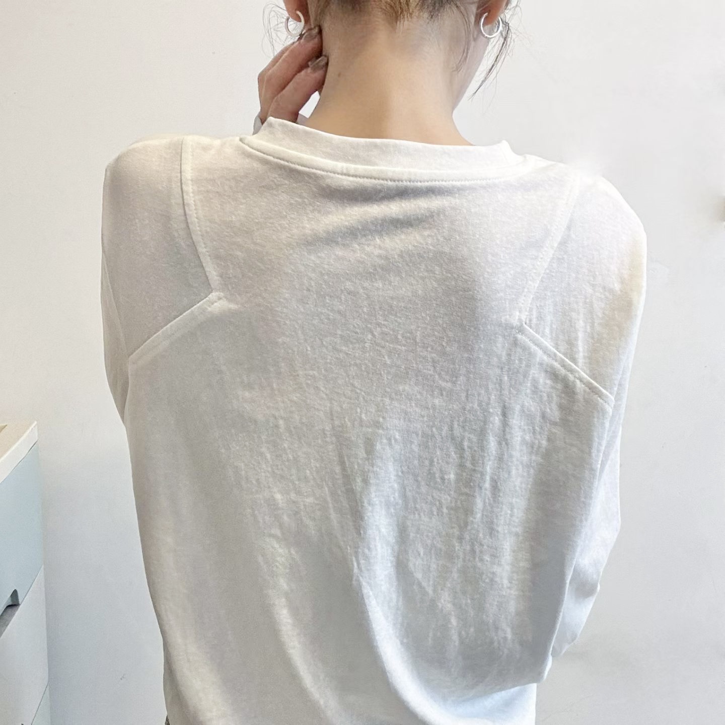 European station white long-sleeved T-shirt early autumn women's clothing 2025 new European goods trendy loose base shirt top