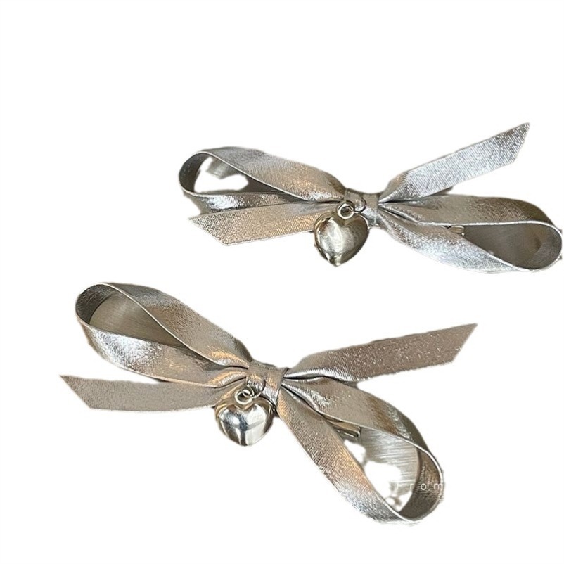 Korean-style new sweet and cool girl silver bow hair clip, niche personality heart-shaped hairpin top clip headwear wholesale