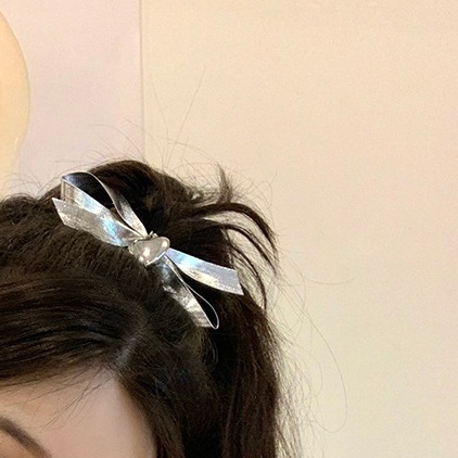 Korean-style new sweet and cool girl silver bow hair clip, niche personality heart-shaped hairpin top clip headwear wholesale