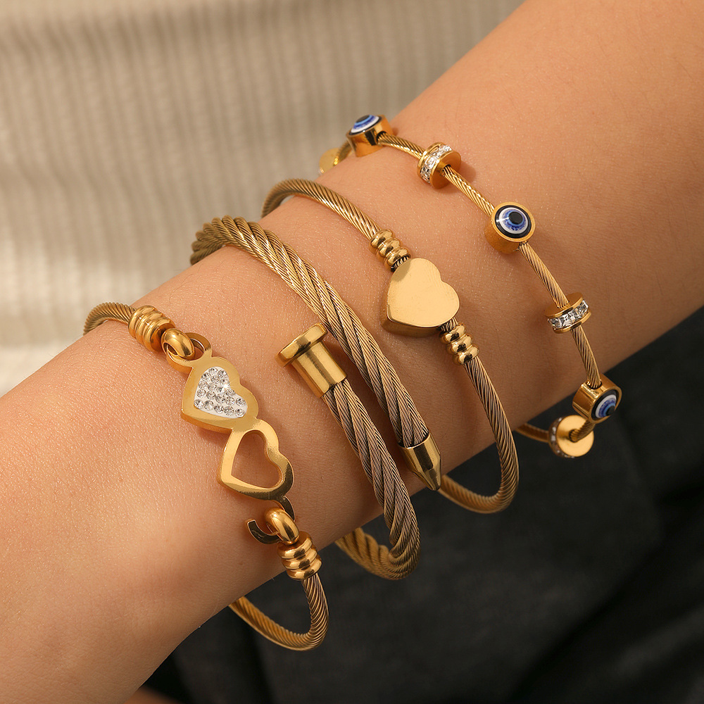 2 * PCS cross-border stainless steel jewelry Europe and the United States love heart diamond Fried Dough Twists high sense versatile eye style bracelet women