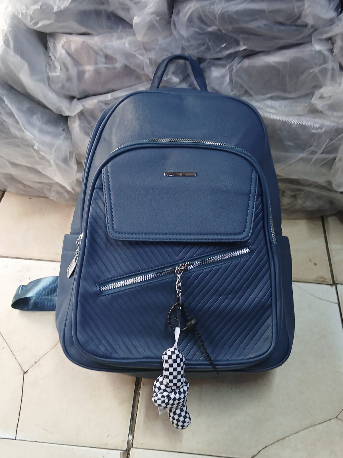 Genuine Leather Laptop Backpack Stylish Durable Unisex Bag Spacious Travel Work School Bag Comfortable Shoulder Straps Secure Compartments Premium Quality