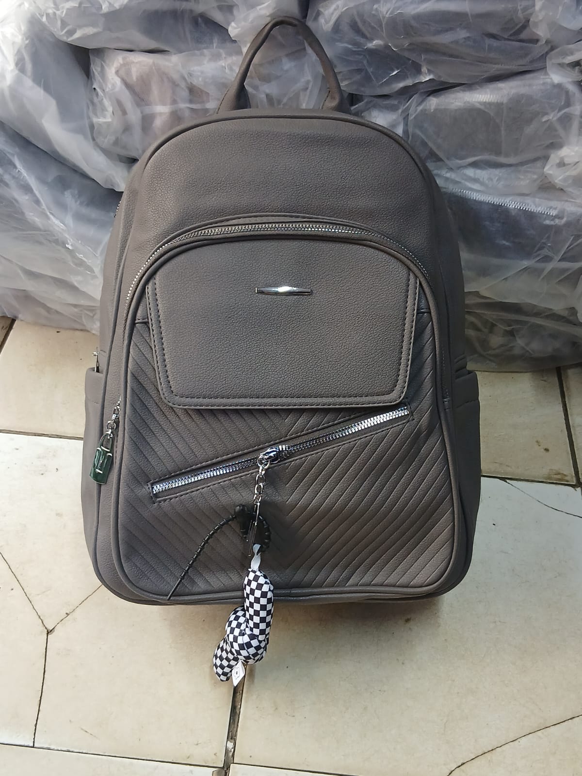 Genuine Leather Laptop Backpack Stylish Durable Unisex Bag Spacious Travel Work School Bag Comfortable Shoulder Straps Secure Compartments Premium Quality