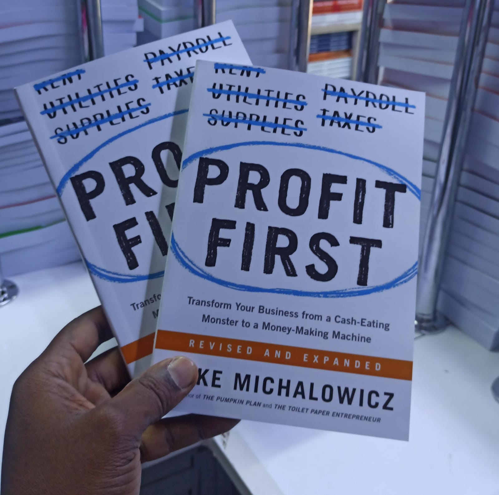 Profit First: Transform Your Business from a Cash-Eating Monster to a Money-Making Machine (Revised and Expanded Edition) by Mike Michalowicz – Business Finance Book on Cash Flow Management Profit