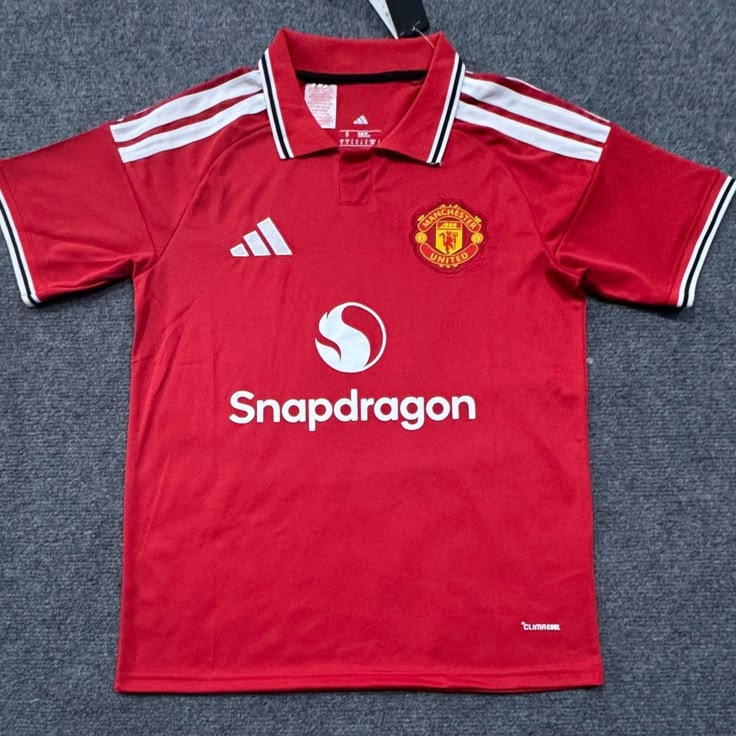 Manchester United 26/27 Home Kit. Inspired by the 1970s era and a tribute to the club's FA Cup victory.