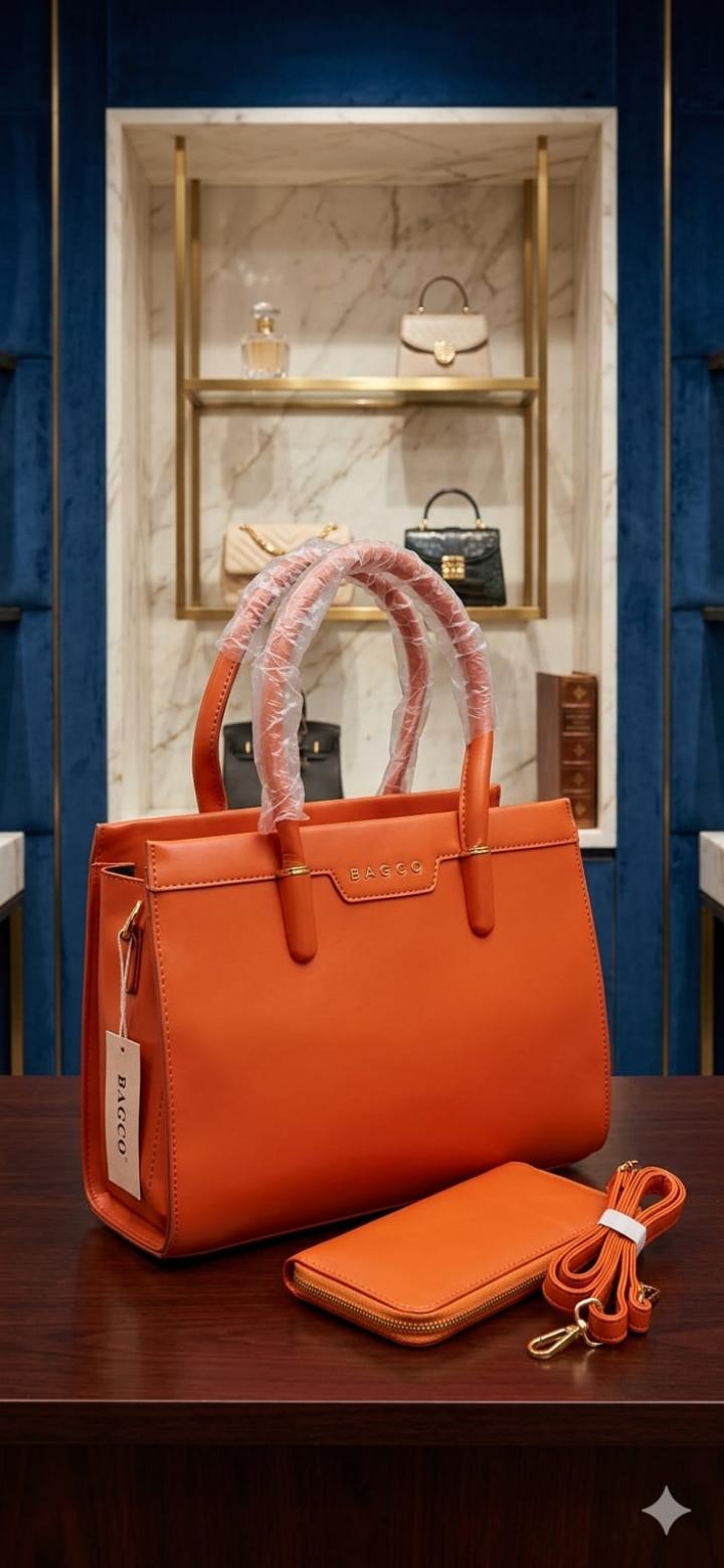 luxury red handbag set displayed in what looks like a high-end boutique or showroom.