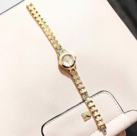 Elegant Gold Quartz Watch with Unique Link Design - Perfect for Daily Wear