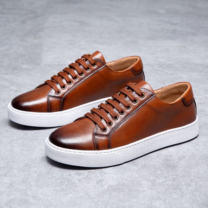 High end men's low cut anti slip and wear-resistant plus size trendy youth board shoes travel lightweight soft soled shoes men's shoes