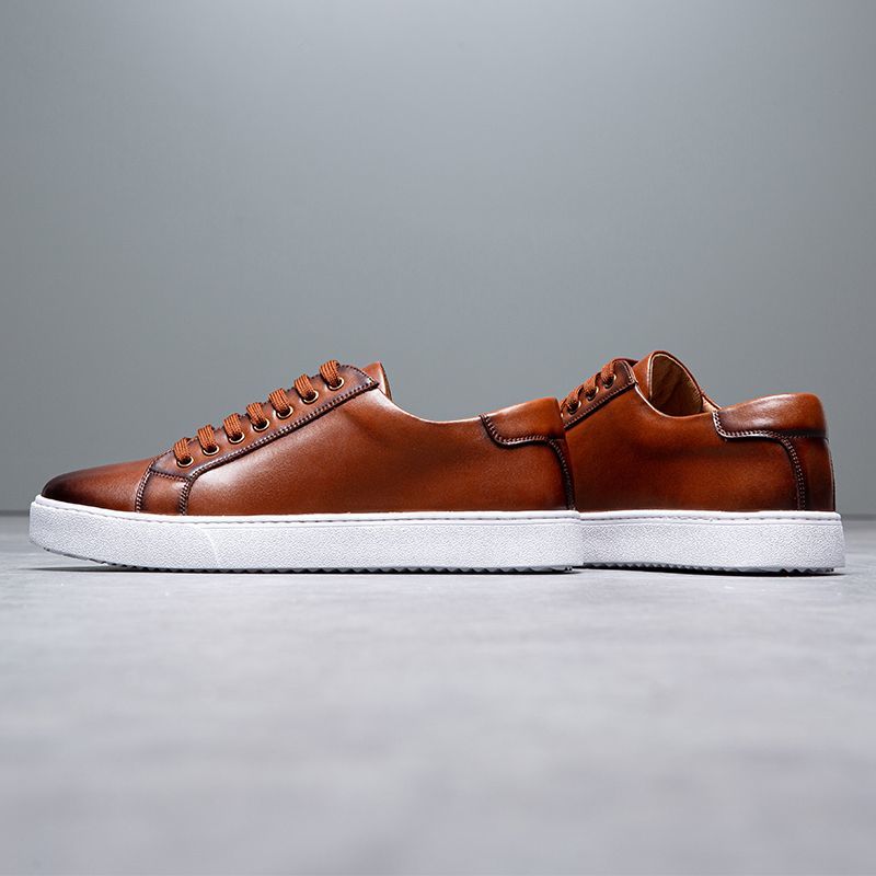 High end men's low cut anti slip and wear-resistant plus size trendy youth board shoes travel lightweight soft soled shoes men's shoes