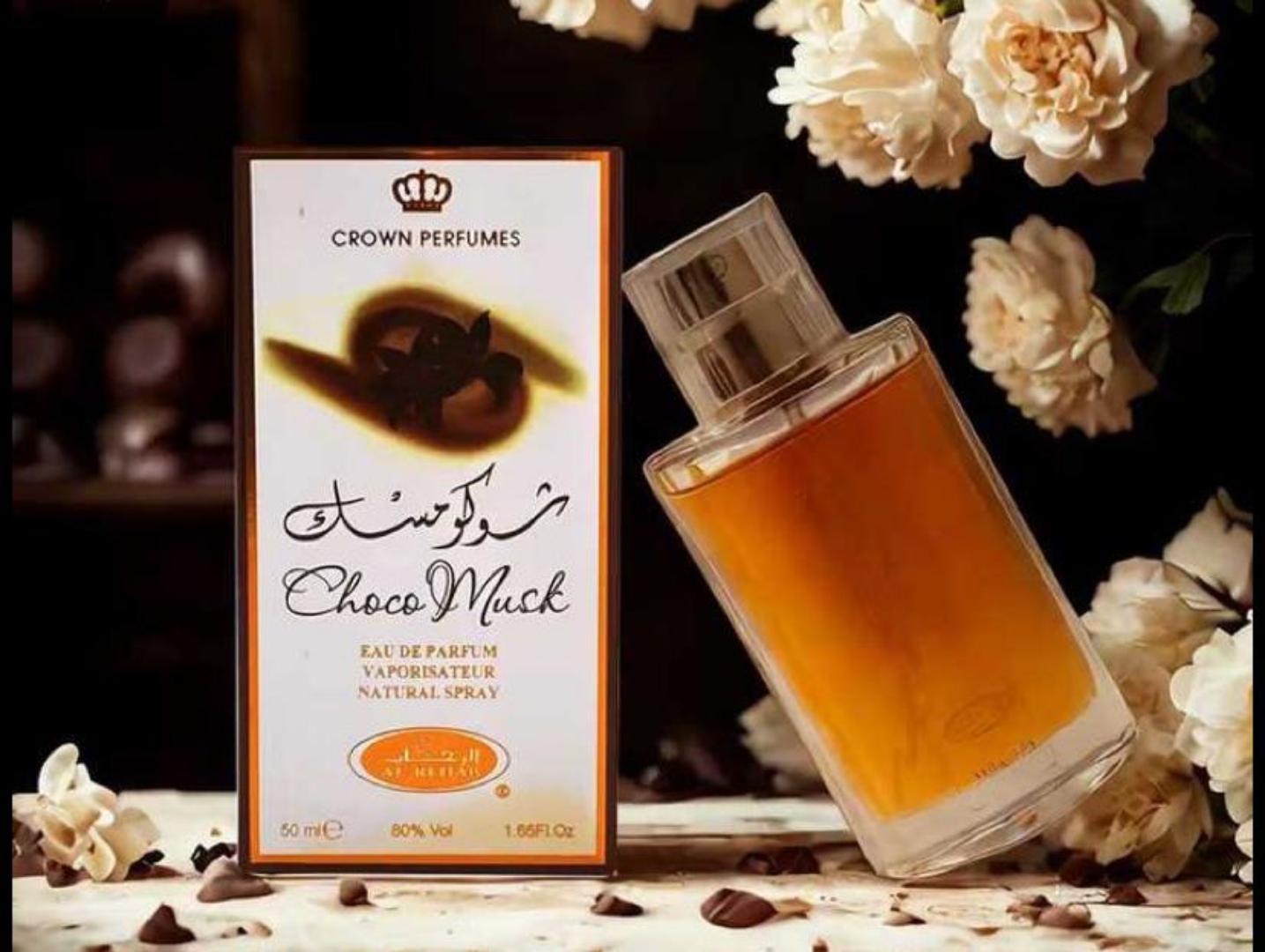 Choco Musk by Al-Rehab is a 50ml Eau de Parfum with a warm, sweet chocolate gourmand scent. The amber liquid in a clear glass bottle offers a cozy, indulgent aroma blending chocolate, vanilla, musk.