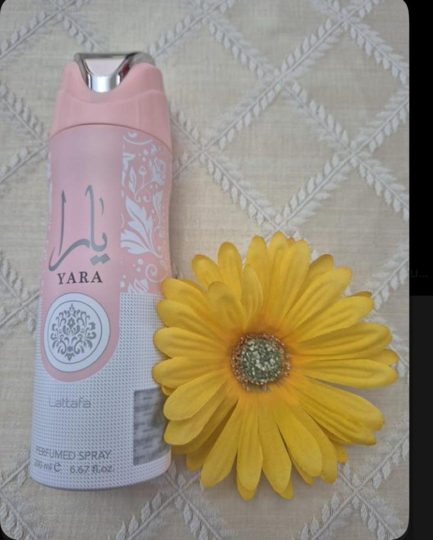 Lattafa Yara 200ml: Two-tone pink and off-white can with silver Arabic calligraphy, "YARA" and floral medallion. Sweet gourmand scent of mango, coconut, jasmine, vanilla, musk. Light, creamy, perfect