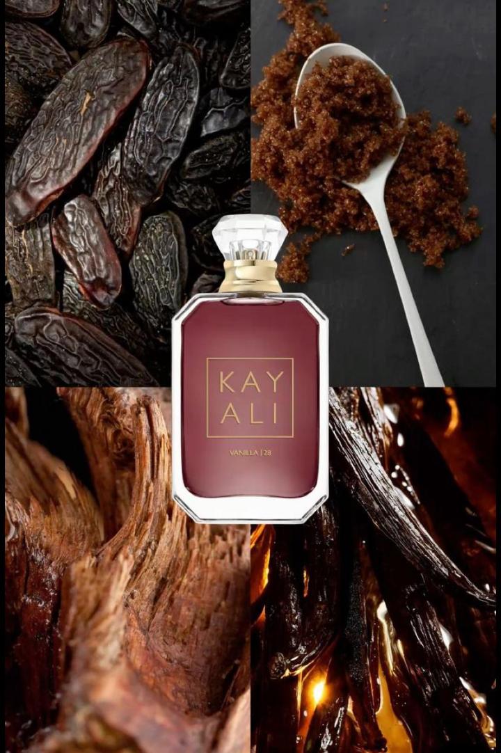 100Ml Kayali Vanilla | 28 perfume in a faceted glass bottle with gold accents and a crystal-like cap. Deep amber-red juice inside. The label shows "KAY ALI" in gold within a square frame.