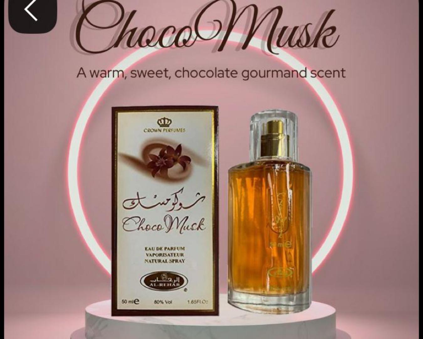 Choco Musk by Al-Rehab is a 50ml Eau de Parfum with a warm, sweet chocolate gourmand scent. The amber liquid in a clear glass bottle offers a cozy, indulgent aroma blending chocolate, vanilla, musk.