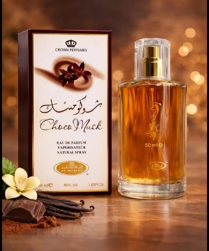 Choco Musk by Al-Rehab is a 50ml Eau de Parfum with a warm, sweet chocolate gourmand scent. The amber liquid in a clear glass bottle offers a cozy, indulgent aroma blending chocolate, vanilla, musk.
