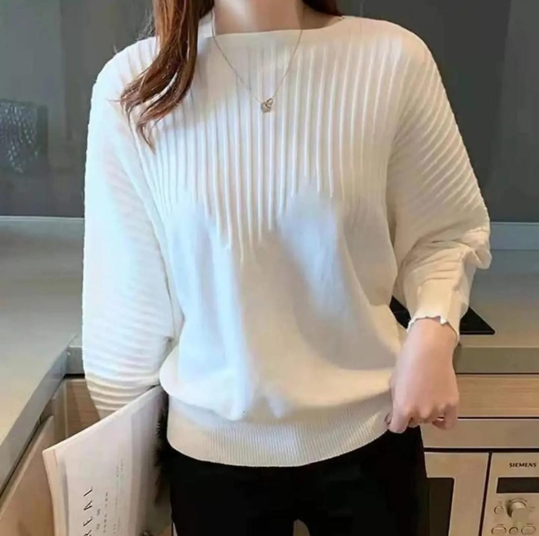 Trendy Ladies Fashion and elegant sweater with relaxed fit long sleeves and soft fabric designed for comfort and style perfect for casual outings work settings and effortless fashion looks