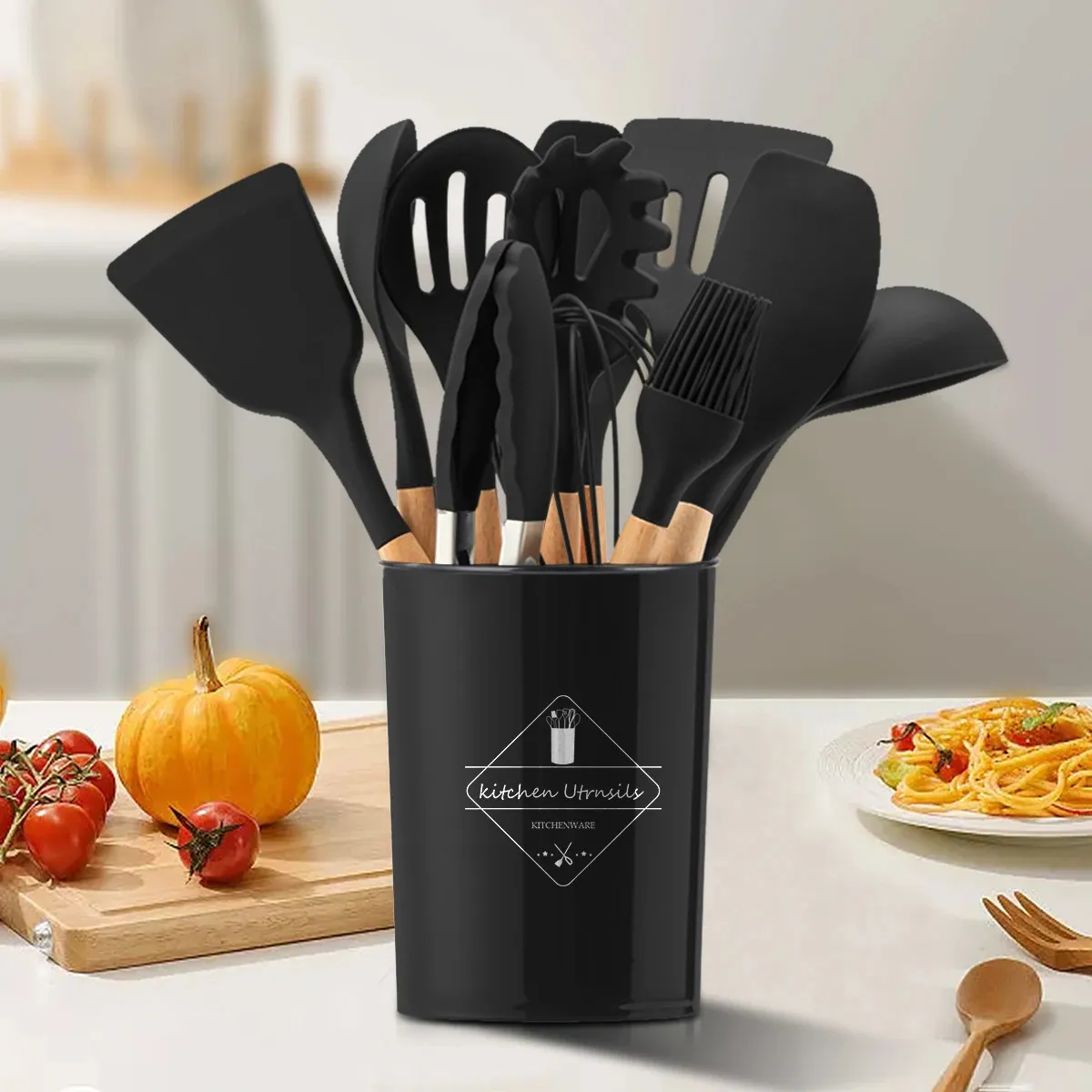 12-piece Silicone Kitchenware Set that includes Ladle Fork, Spoonula, Slotted Spoon, Kitchen Tong, Slotted turner, Whisk, Brush, Large Spatula, Small Spatula, Egg Separator and Holder.