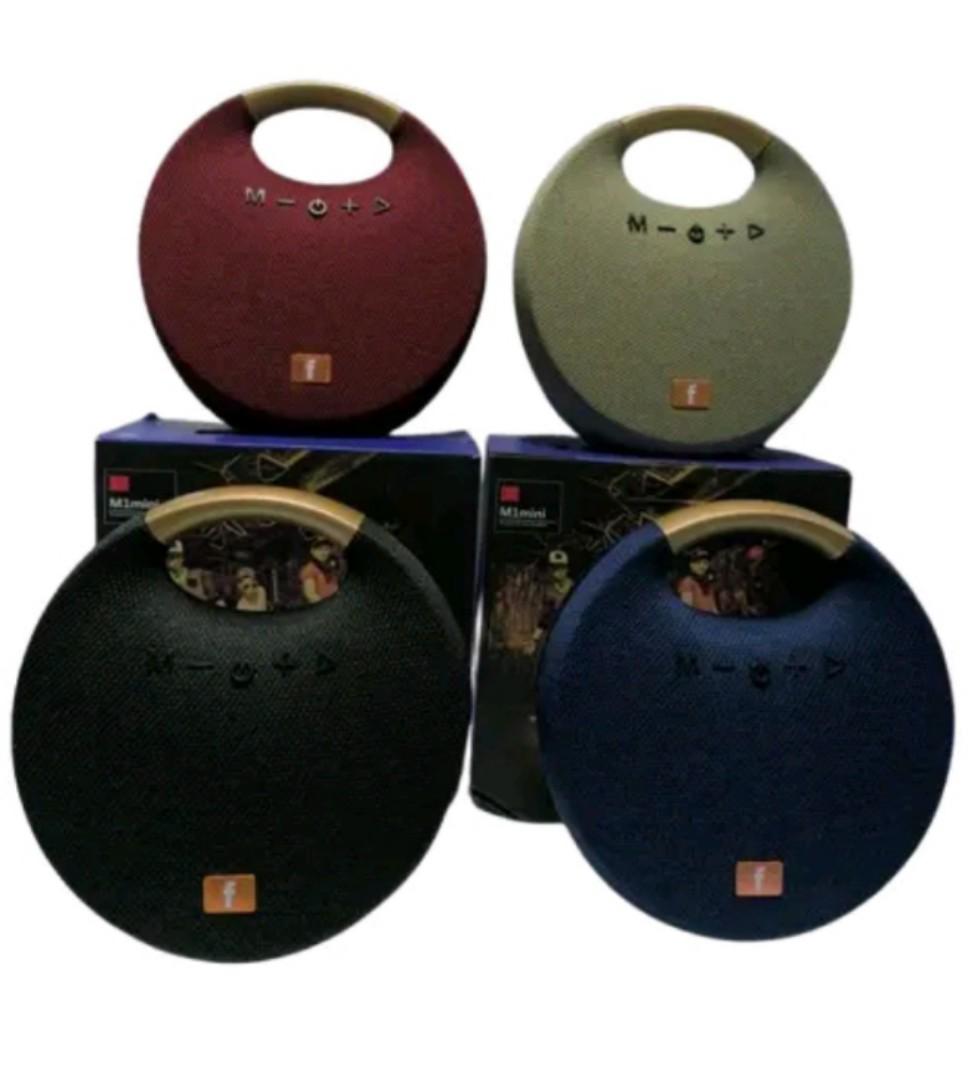 M1 Mini speaker is a compact, portable wireless speaker featuring a round, pebble-like design . Only black color available 🔥🔥🔥