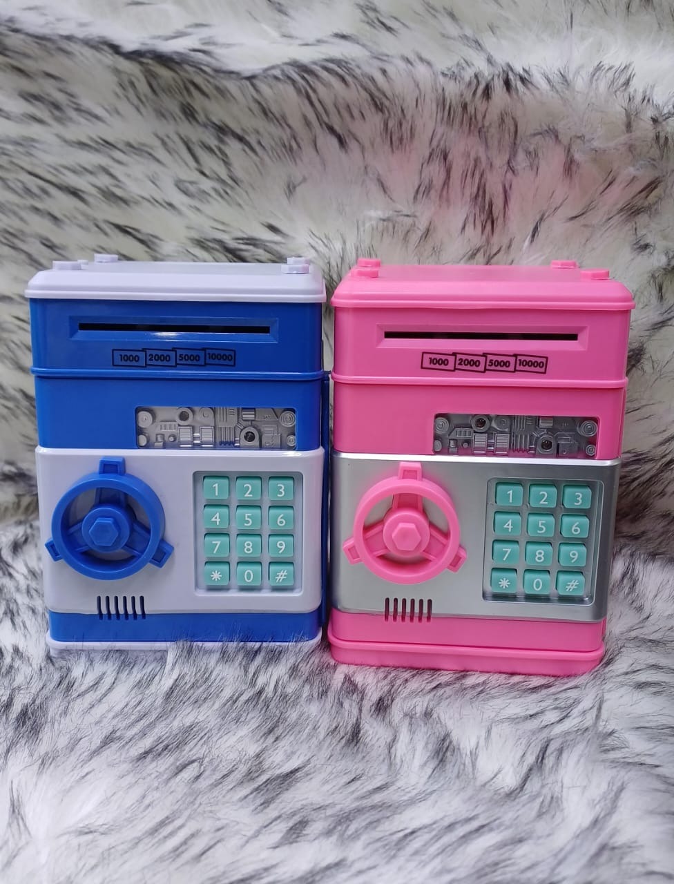 PIGGY BANK They feature a customizable 4-digit password lock, an automatic banknote feeder, and a coin slot.