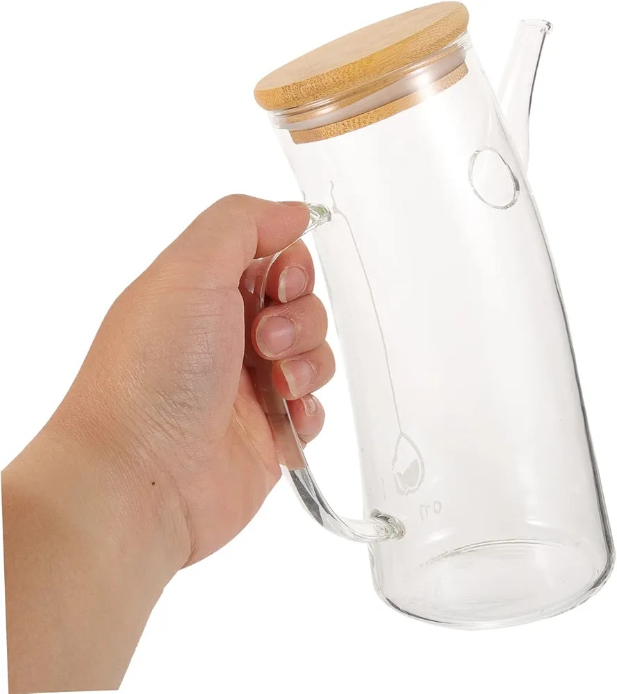 700ml Multipurpose curved oil Jar, perfect for oil, vinegar, soy sauce, etc. The curved glass oil dispenser can  be used in a bar, cafe shop, hotel, restaurant. The elegant appearance is a wonderful a