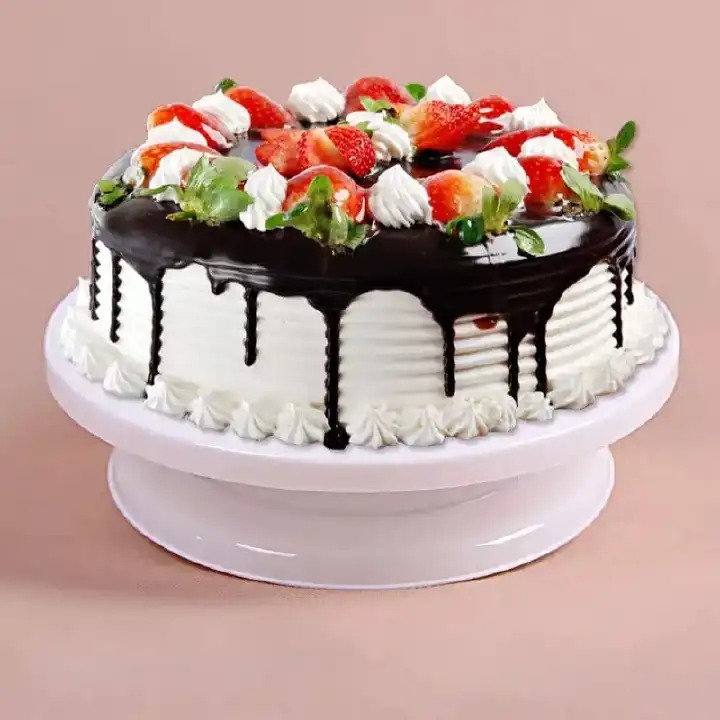 CAKE TURNTABLE. 28CM Cake Decorating Turntable, Designed To Rotate 360 Degrees For Smooth Frosting And Icing Applications.