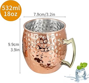 copper Moscow Mule mugs featuring brass handles and a polished finish mugs are traditionally used for serving Moscow Mules because the copper helps keep the drink chilled to enhance flavour .