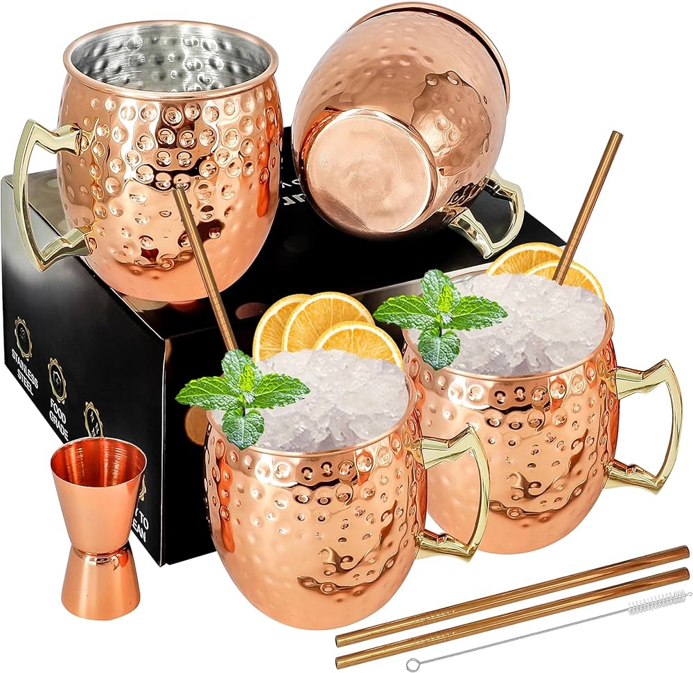 copper Moscow Mule mugs featuring brass handles and a polished finish mugs are traditionally used for serving Moscow Mules because the copper helps keep the drink chilled to enhance flavour .