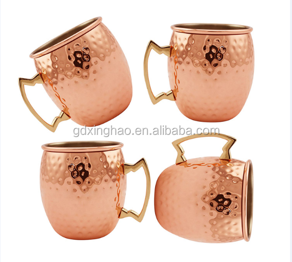 copper Moscow Mule mugs featuring brass handles and a polished finish mugs are traditionally used for serving Moscow Mules because the copper helps keep the drink chilled to enhance flavour .