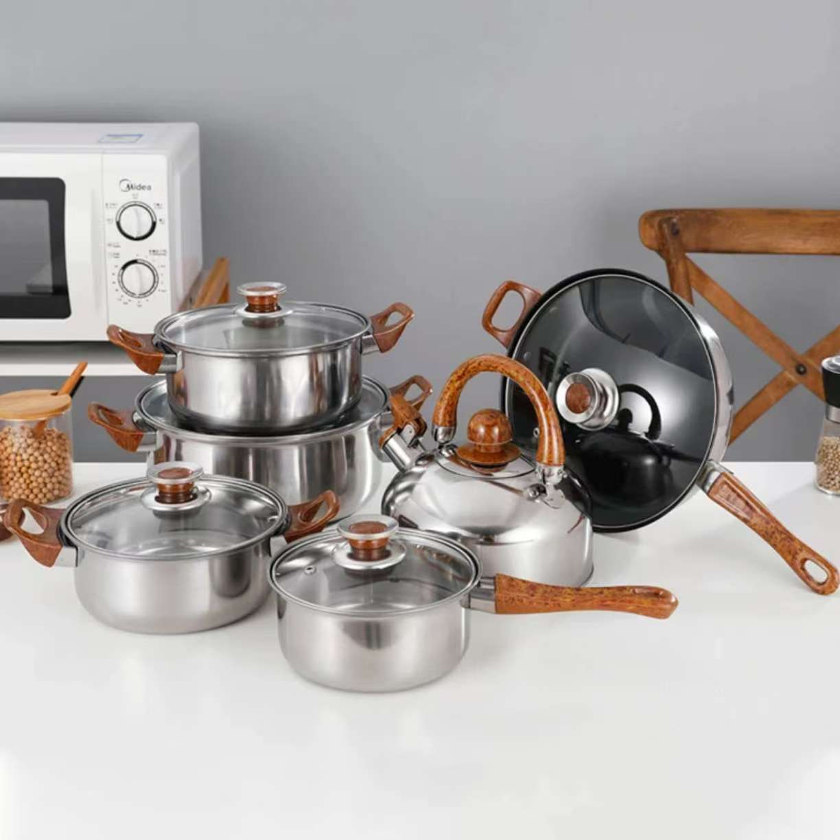 12 pieces Stainless Steel Cooking Pots comes as 4 Sufurias, one Pan , One Kettle and 6 Lids Serve Food while Hot with Cookware Set Silver