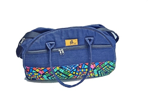 Unisex denim green Ankara travelling bag easy and comfortable to carry, durable and elegant to have.
