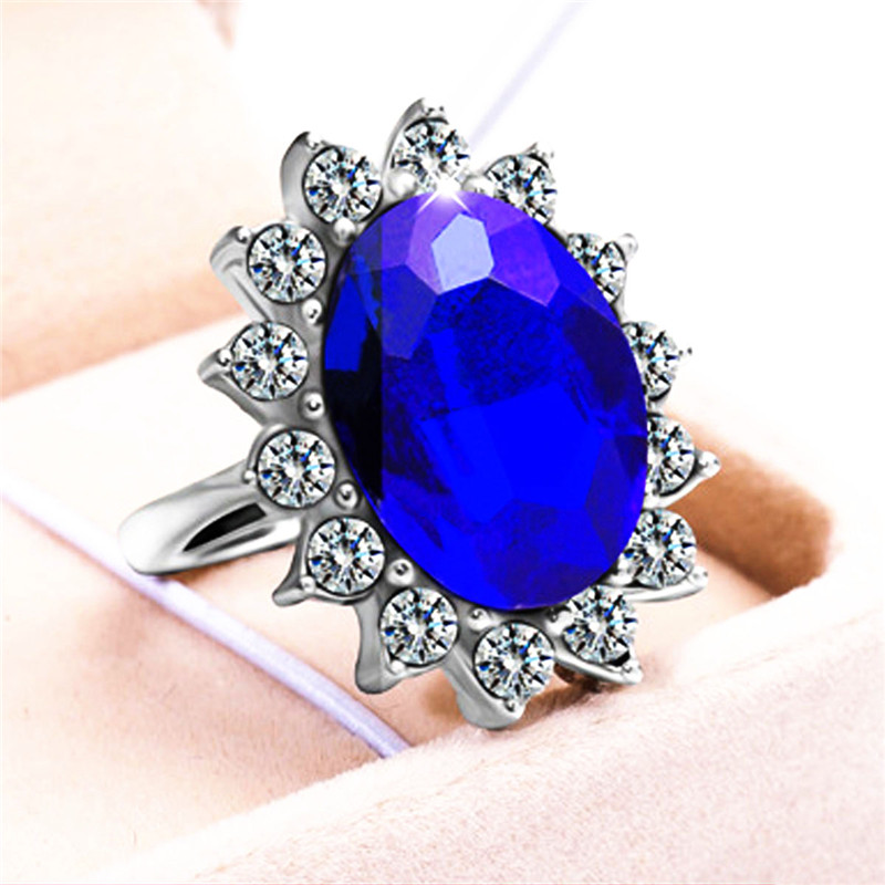 Silver Plated Rhodium Plated Simulated Blue Sapphire and Cubic Zirconia Halo Ring