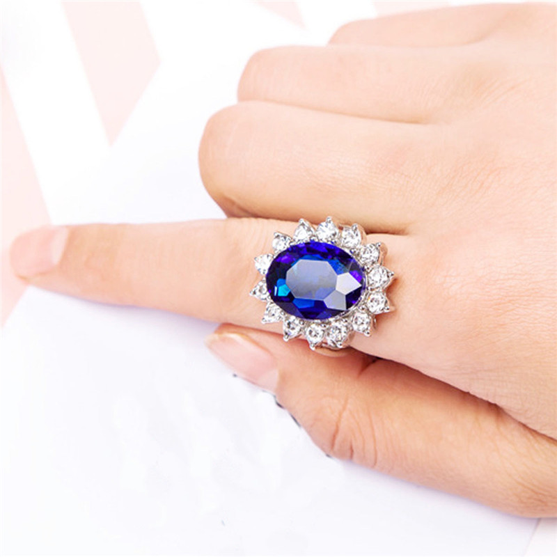 Silver Plated Rhodium Plated Simulated Blue Sapphire and Cubic Zirconia Halo Ring