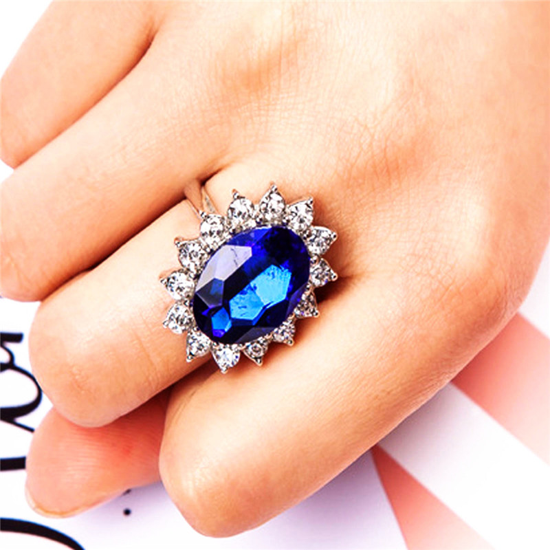 Silver Plated Rhodium Plated Simulated Blue Sapphire and Cubic Zirconia Halo Ring
