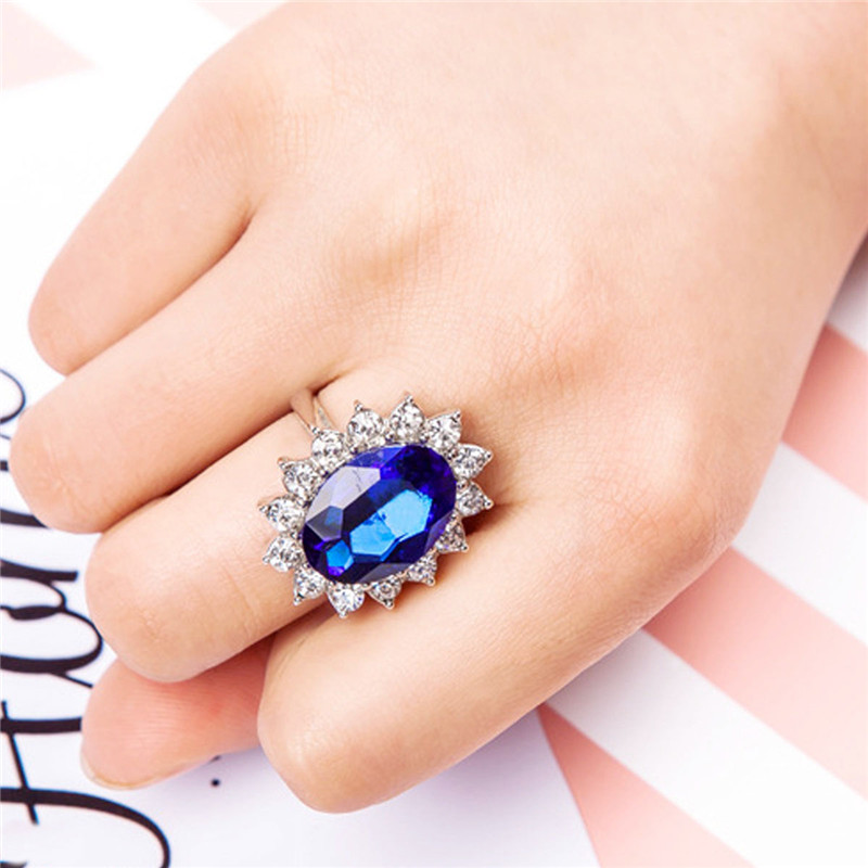 Silver Plated Rhodium Plated Simulated Blue Sapphire and Cubic Zirconia Halo Ring