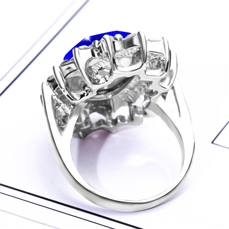 Silver Plated Rhodium Plated Simulated Blue Sapphire and Cubic Zirconia Halo Ring