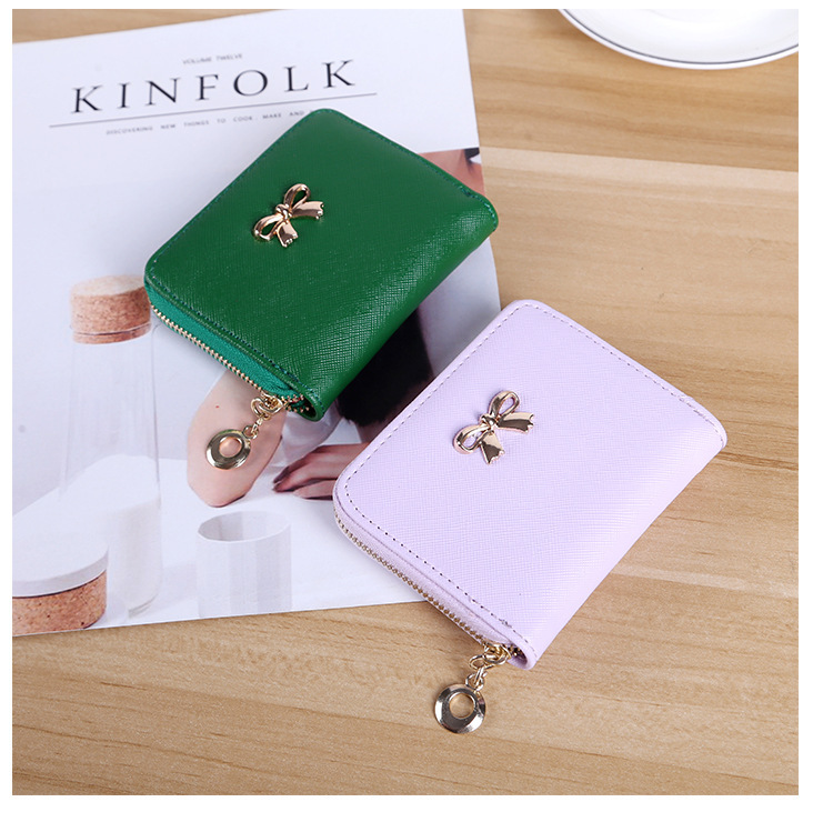 The New lovely Fresh Small wallet Bow tie zipper Coin Purse Female student Wild Hand bag