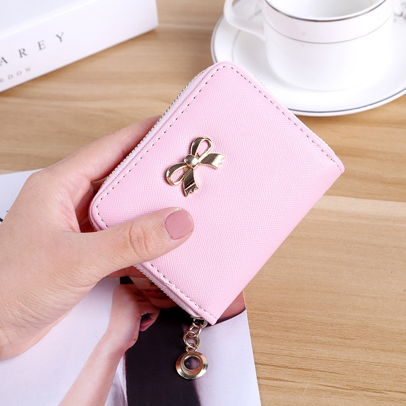 The New lovely Fresh Small wallet Bow tie zipper Coin Purse Female student Wild Hand bag