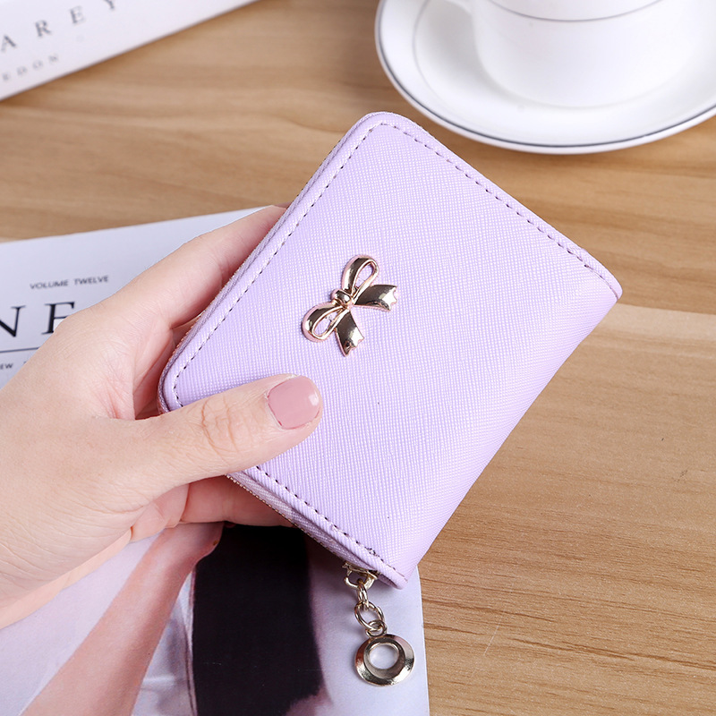 The New lovely Fresh Small wallet Bow tie zipper Coin Purse Female student Wild Hand bag